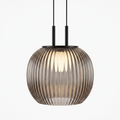 Filano pendant light with ribbed glass shade on white background