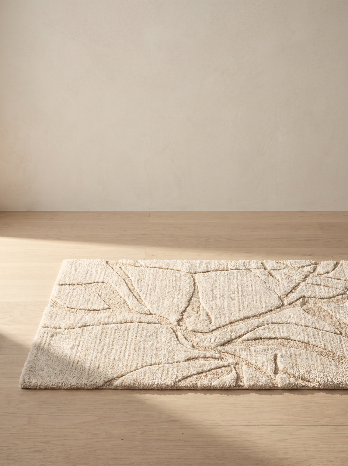 Contour ivory wool rug flat with raking light
